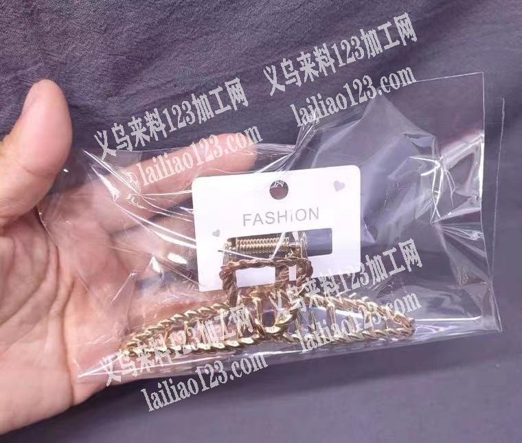 找义乌的手工厂，抓夹上卡包装，有几万个夹