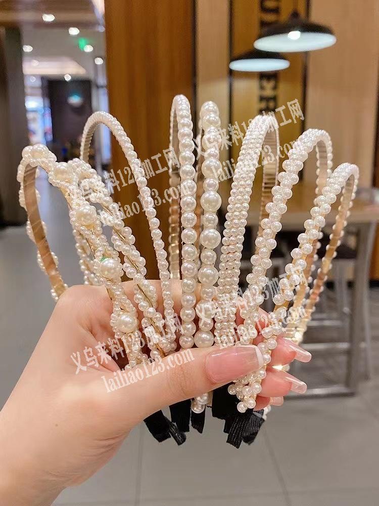 手工活外发，穿珠子，鱼线穿的，然后绕在头