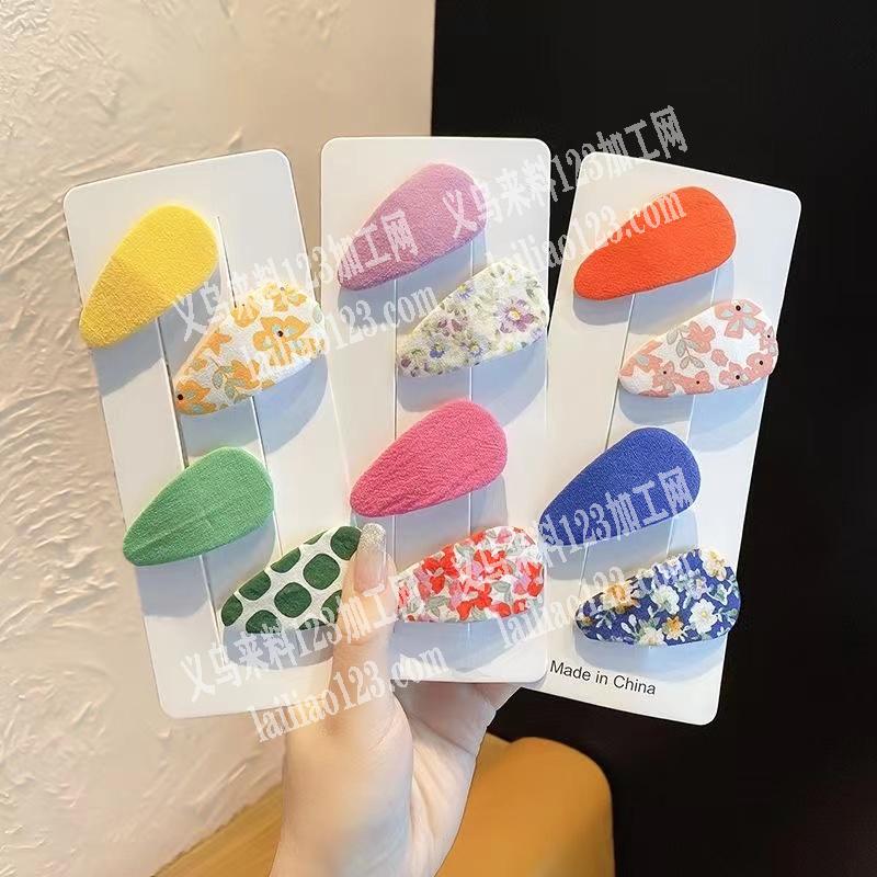 寻找专业生产包布手工发夹的工厂，如图，专