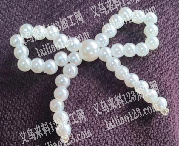 串珠子+编织简单蝴蝶结的手工活外发，如图