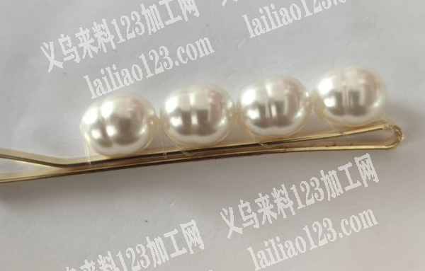 长期发夹上面的手工活外发，如图，鱼线穿珠