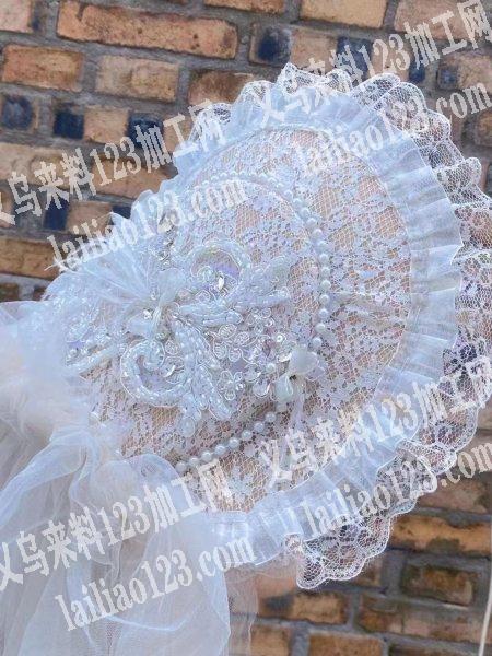 如图，1万头纱缝纫平车活，加钉珠那个珠子