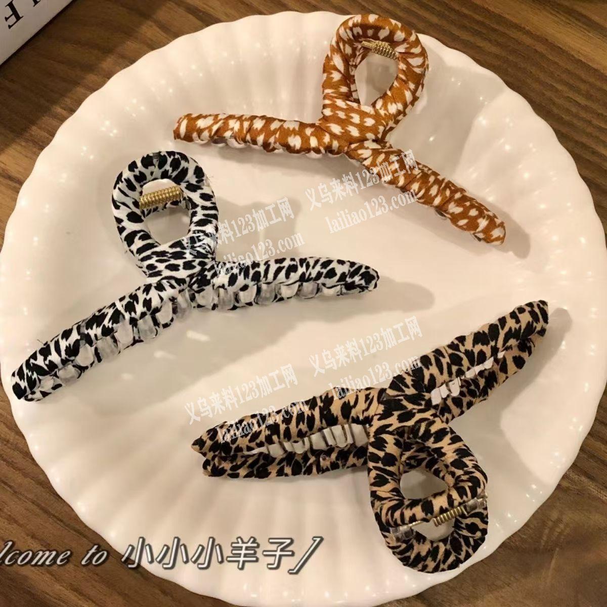 寻找专业做这个绕布条抓夹的工厂，请联系详