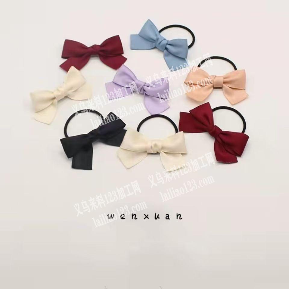 附图片，寻找做蝴蝶结发圈的厂家，如图，专