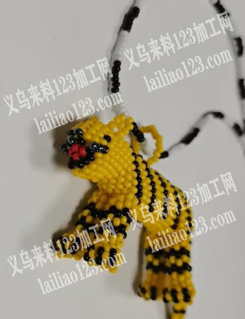 公司穿米珠编织老虎的手工活，如图，寻找会