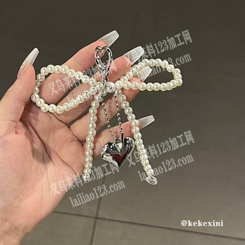 《发外地》手工活穿珠子编织绑蝴蝶结的手工