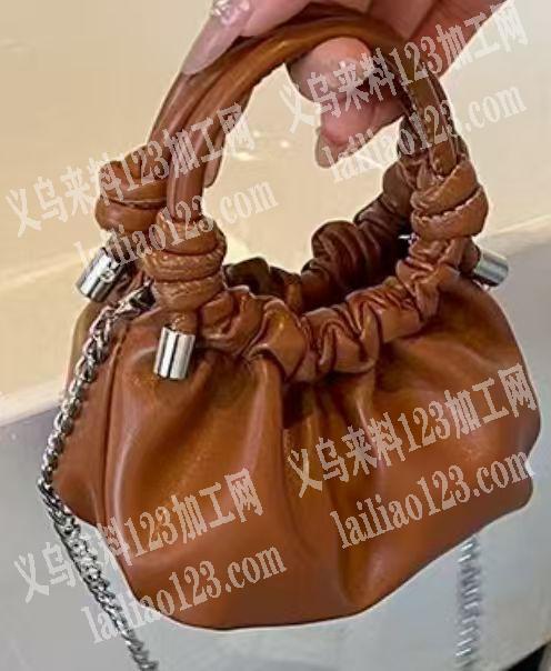 这个小手提包，找箱包工厂，附图片。这种包