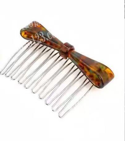 蝴蝶结发梳订单，寻找工厂，请联系详谈。