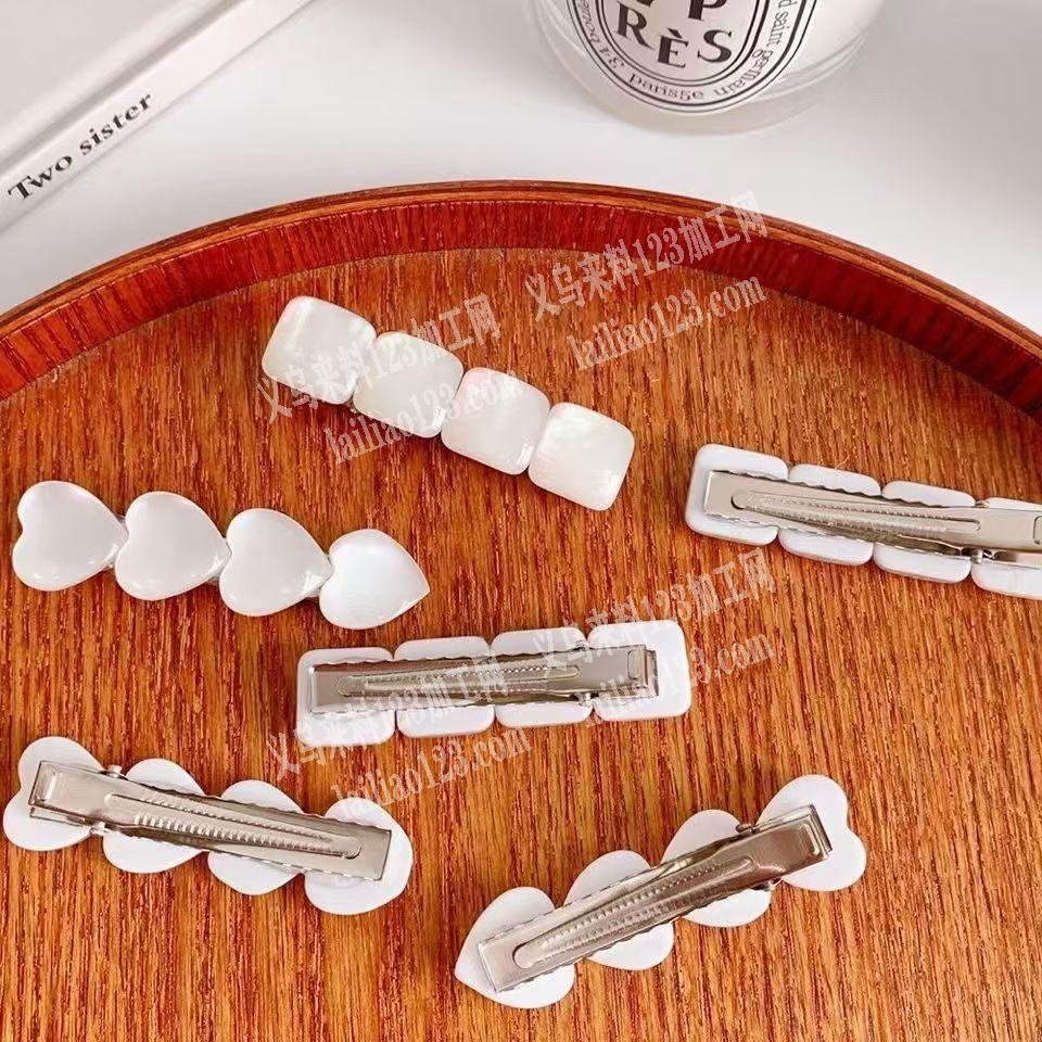 ·发夹上面粘配件的手工活外发，如图，寻找