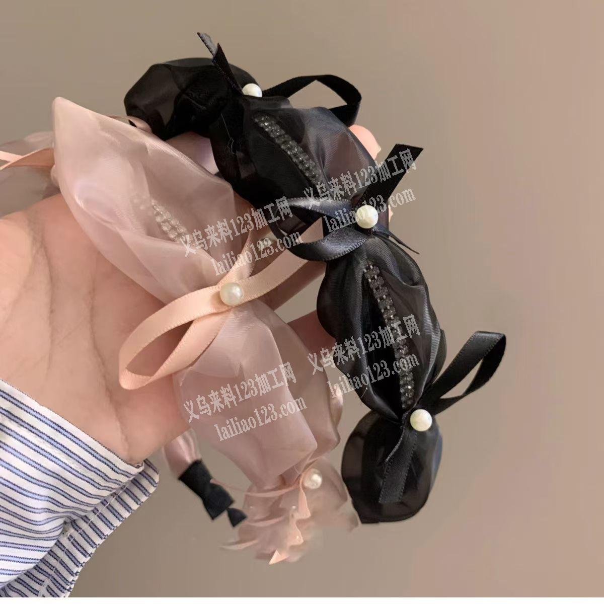 大量网纱绑蝴蝶结的布艺发箍订单外发加工，