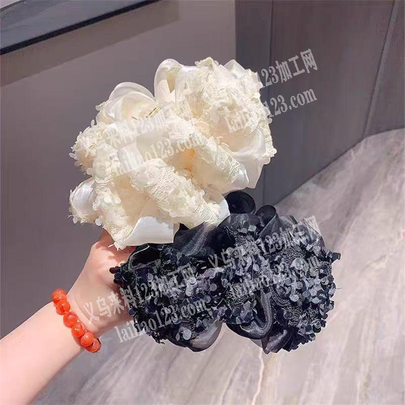 如图类似的亮片布印网纱抓夹花成品订单，寻