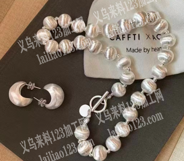 公司重工拉丝饰品订单，如图，寻找成品工厂