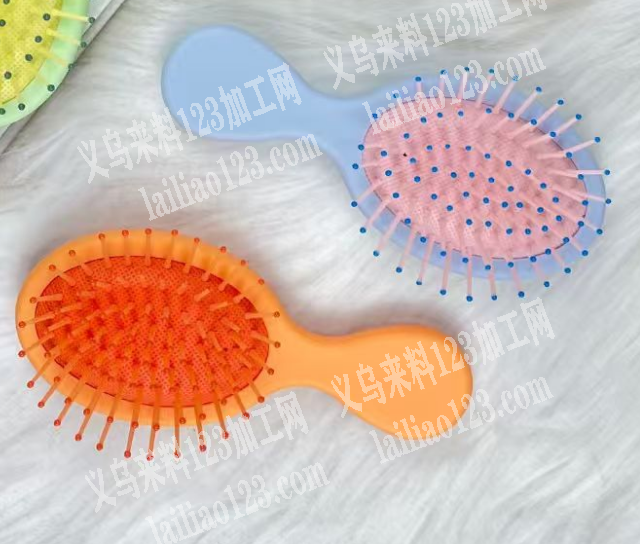 寻找按摩梳子厂家，。有订单，大量卡通梳子